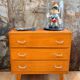 Compass leg chest of drawers