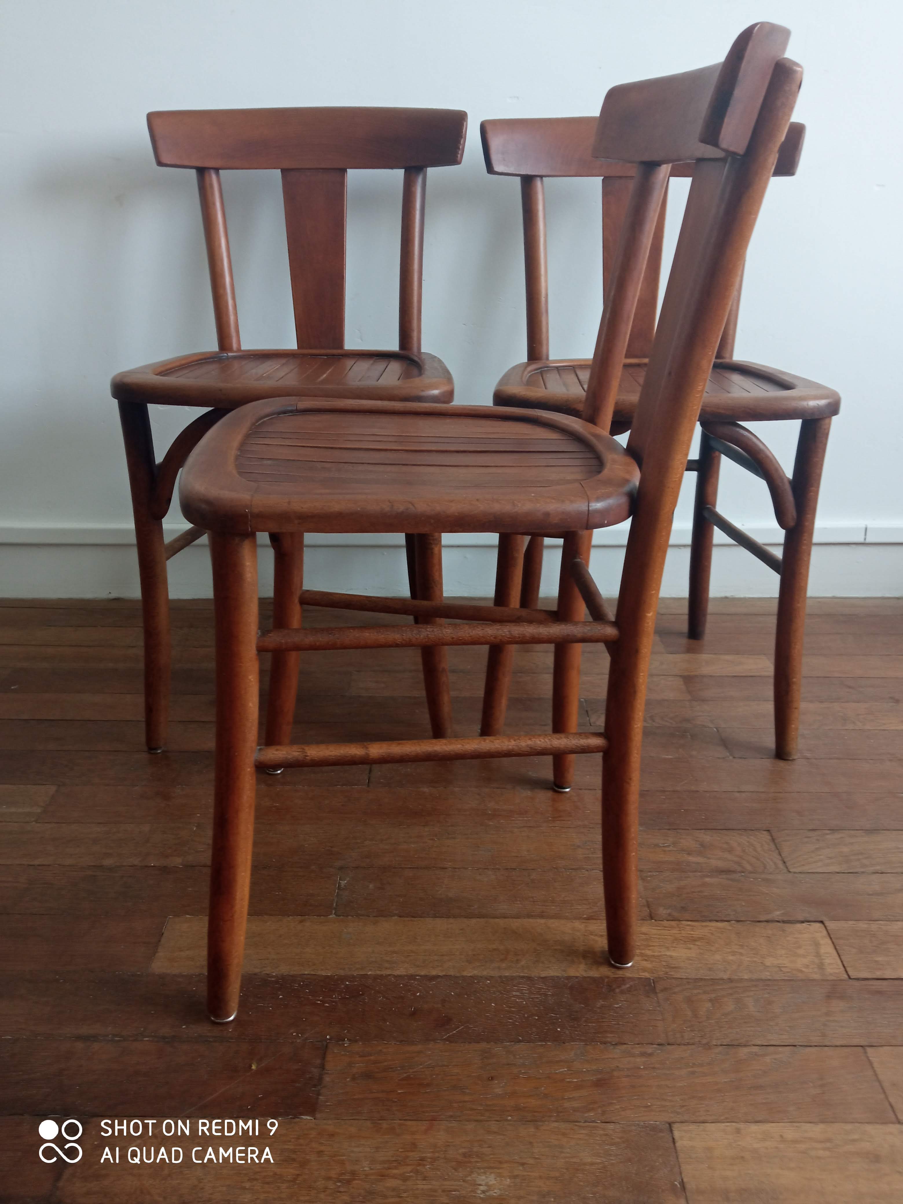 Trio of old bistro chairs