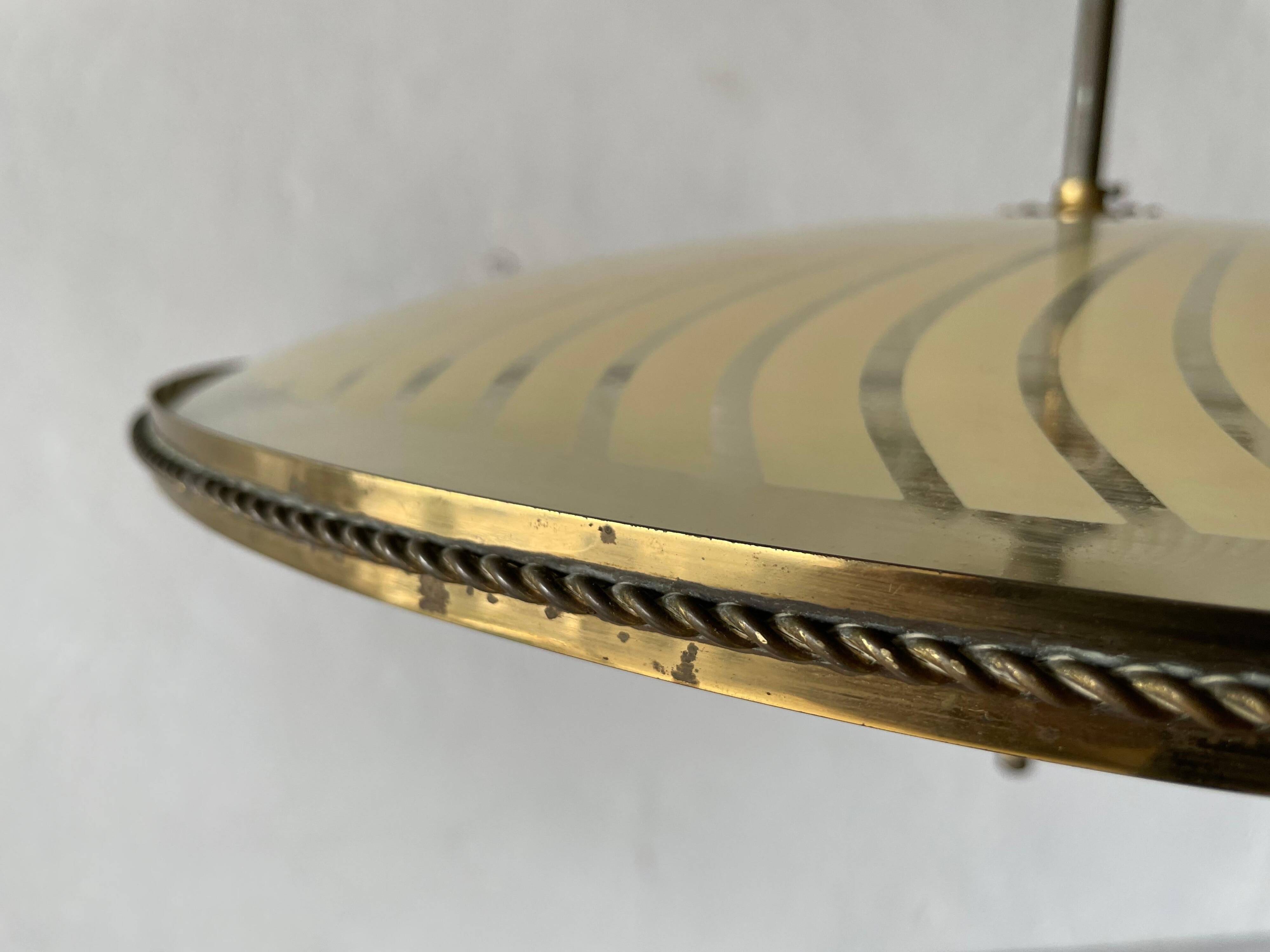 Large UFO design ceiling light in brass and printed glass, 1950s, Italy.