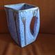 Beautiful iridescent mauve ceramic jug.