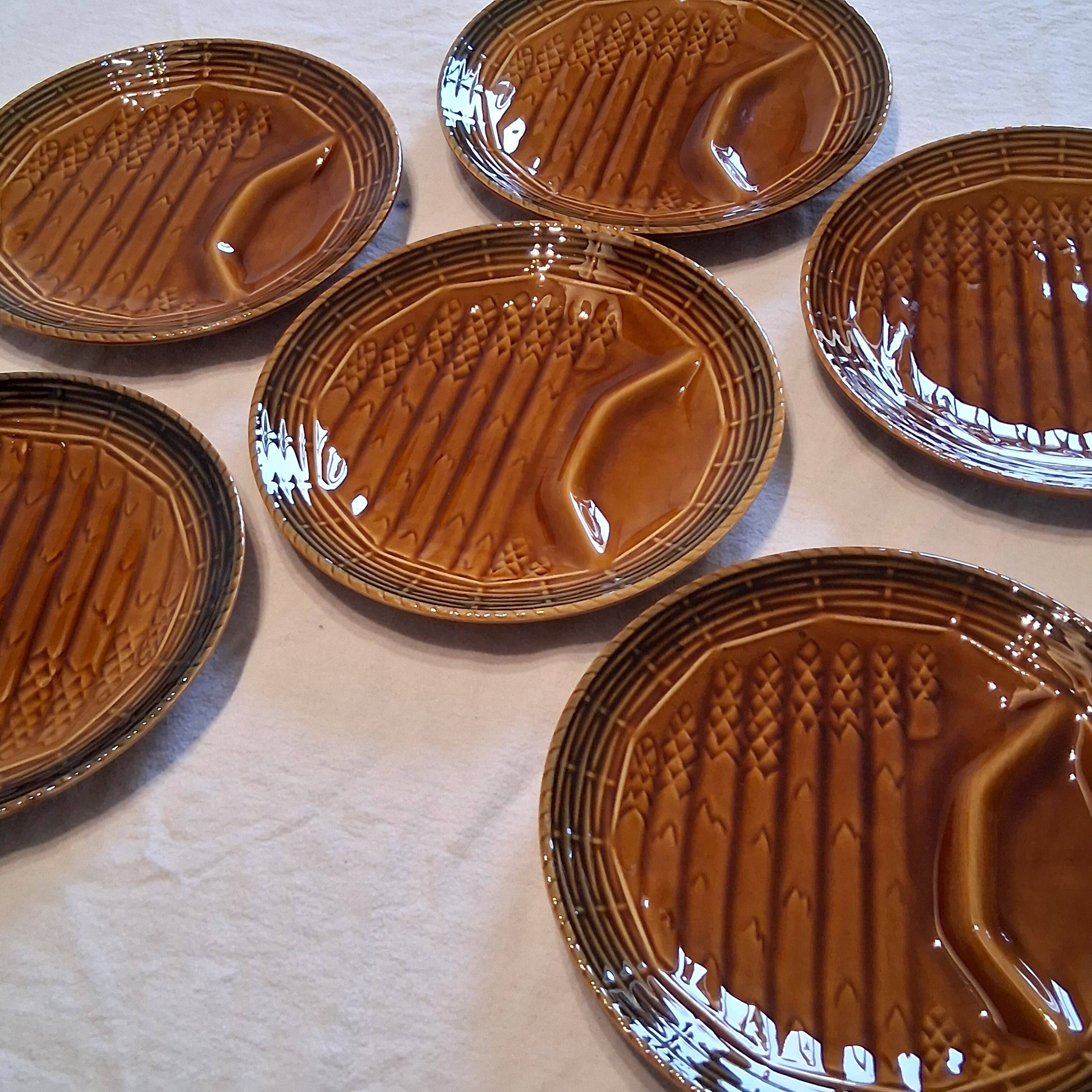 6 asparagus plates stamped "Sarreguemines" on the back in very good condition.