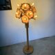 Ornamental floor lamp with "flower" patterns from the 1970s.