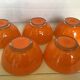 Five old orange duralex bowls