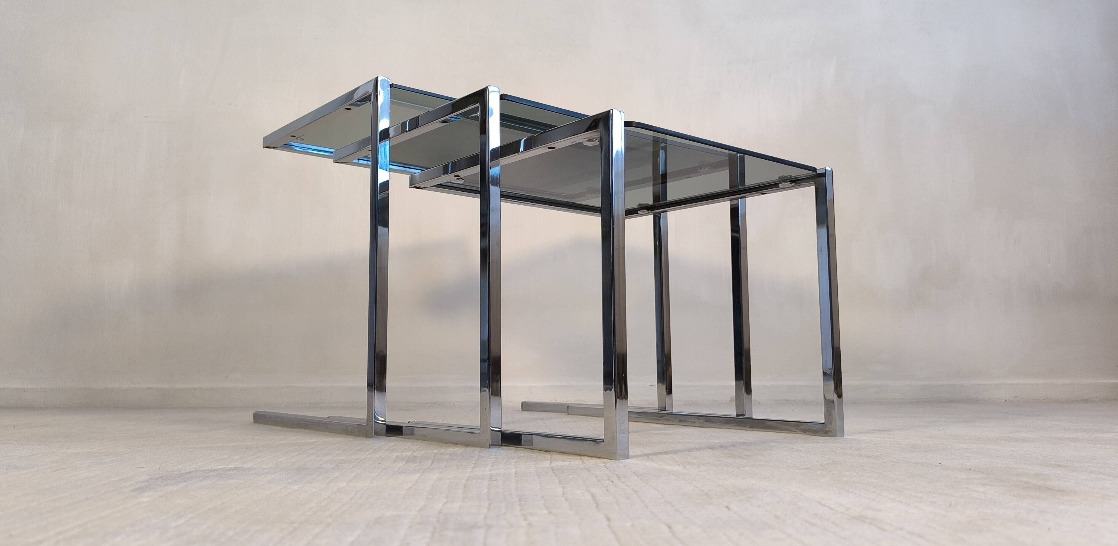 Set of 3 vintage nesting tables in chrome and smoked glass, Roche Bobois style.