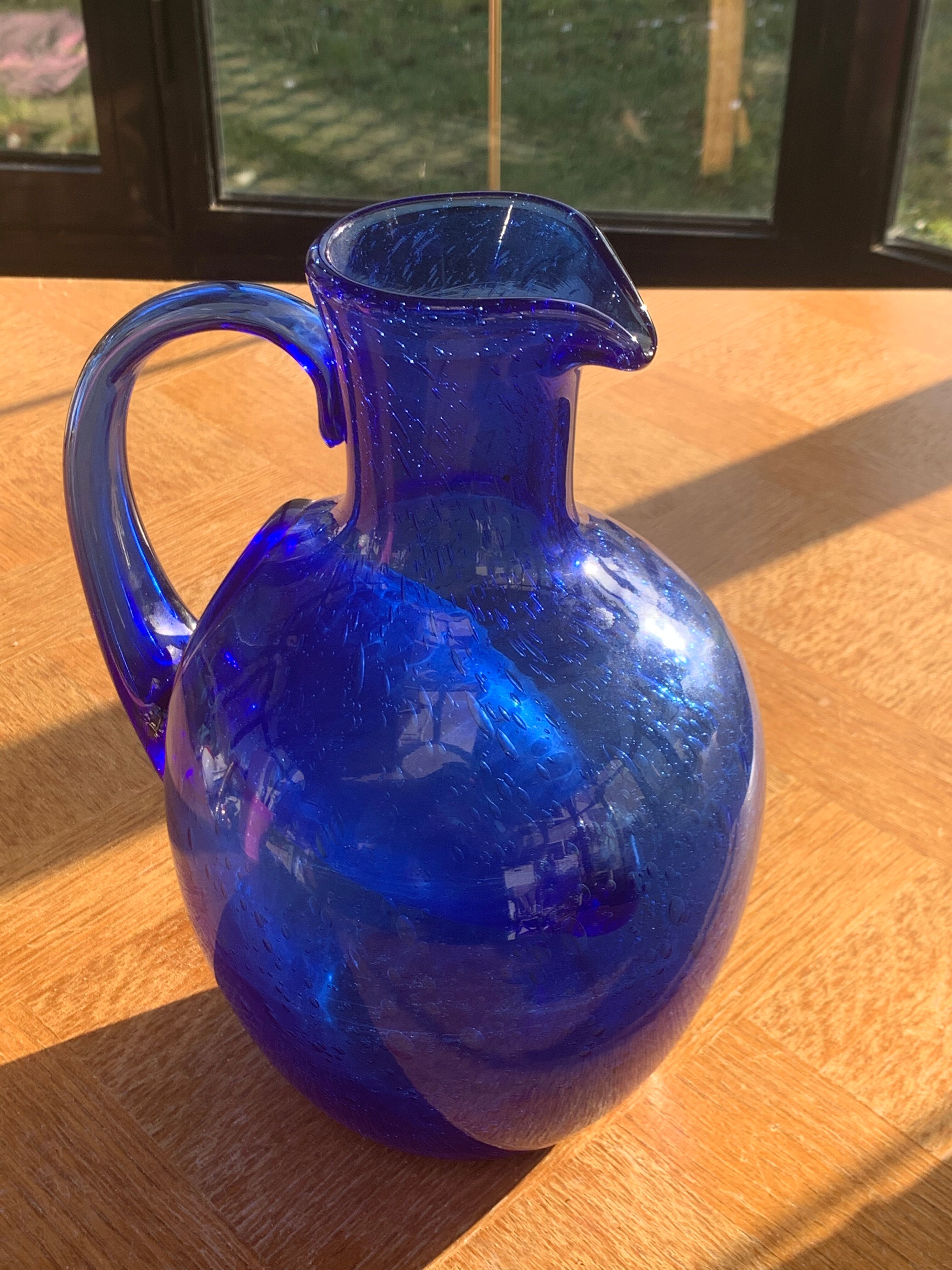 Blue blown glass ice decanter from vintage biot glassware
