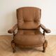 Pair of vintage 1970s armchairs in solid oak and cognac faux leather.