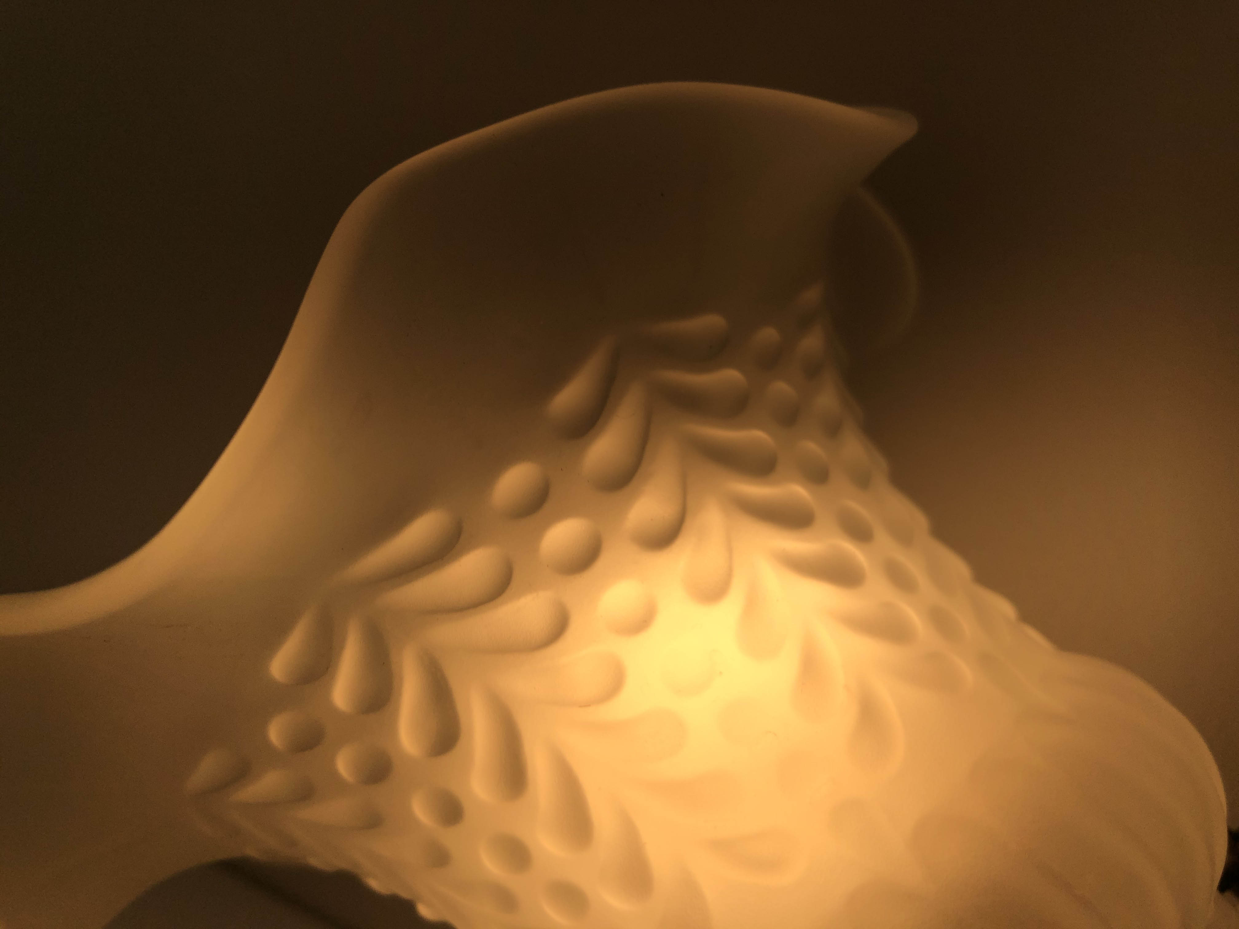 Ancient bronze and opalescent glass sconce