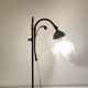 Brass table lamp with a glass shade