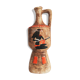 Egyptian pattern ceramic pitcher, red-orange enamels
