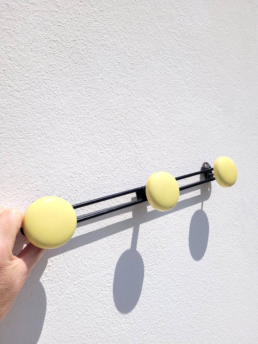 60s yellow wall coat rack