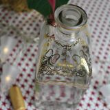 Decorated rectangular glass carafe
