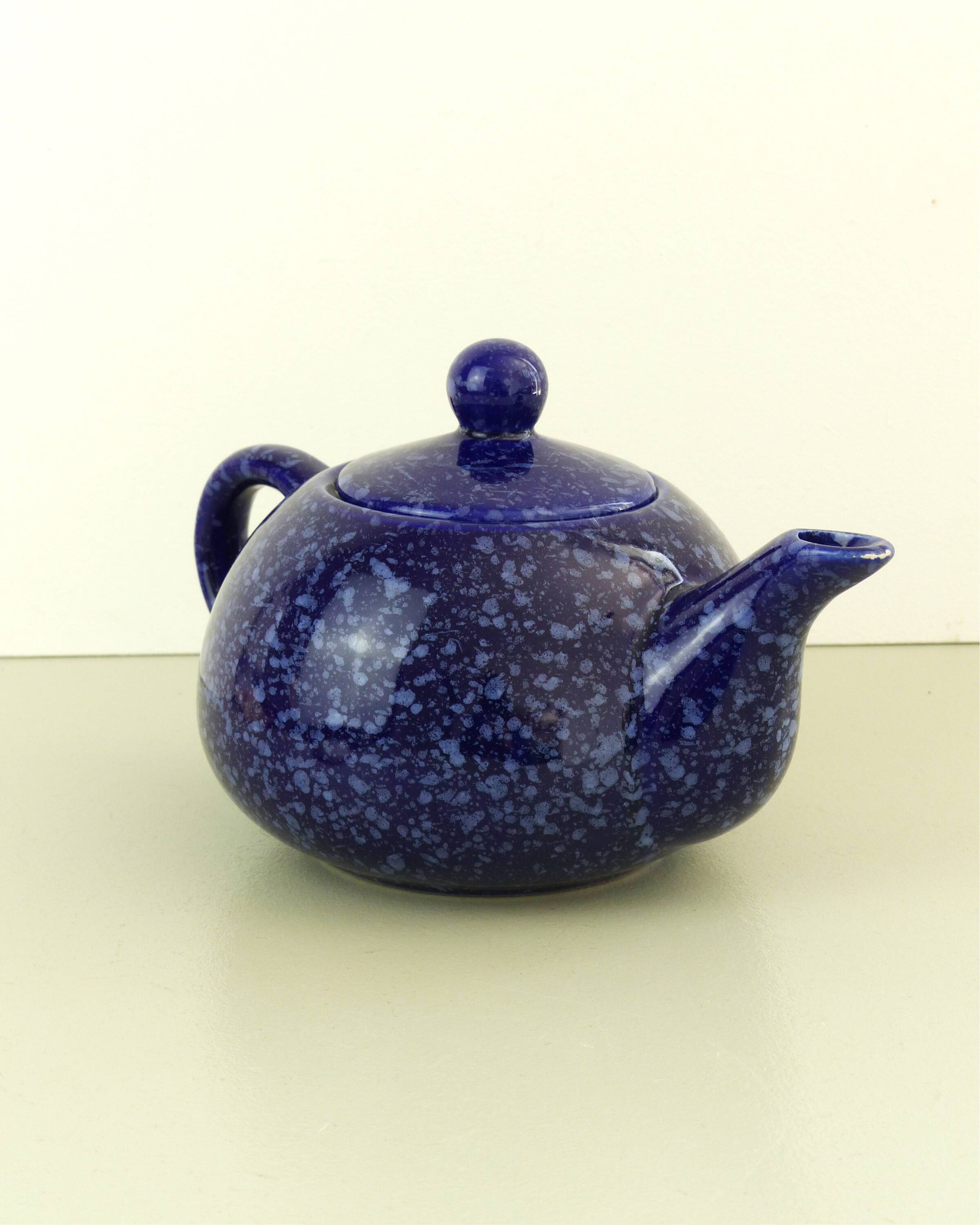 Blue glazed and speckled ceramic teapot