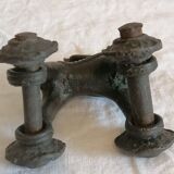 Old child's toy. Horse with bronze wheels. Ethnic object.