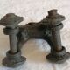 Old child's toy. Horse with bronze wheels. Ethnic object.