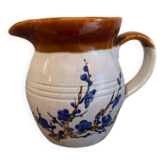 Decorated stoneware carafe