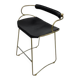 Bar stool with a vintage brass backrest and black leather.