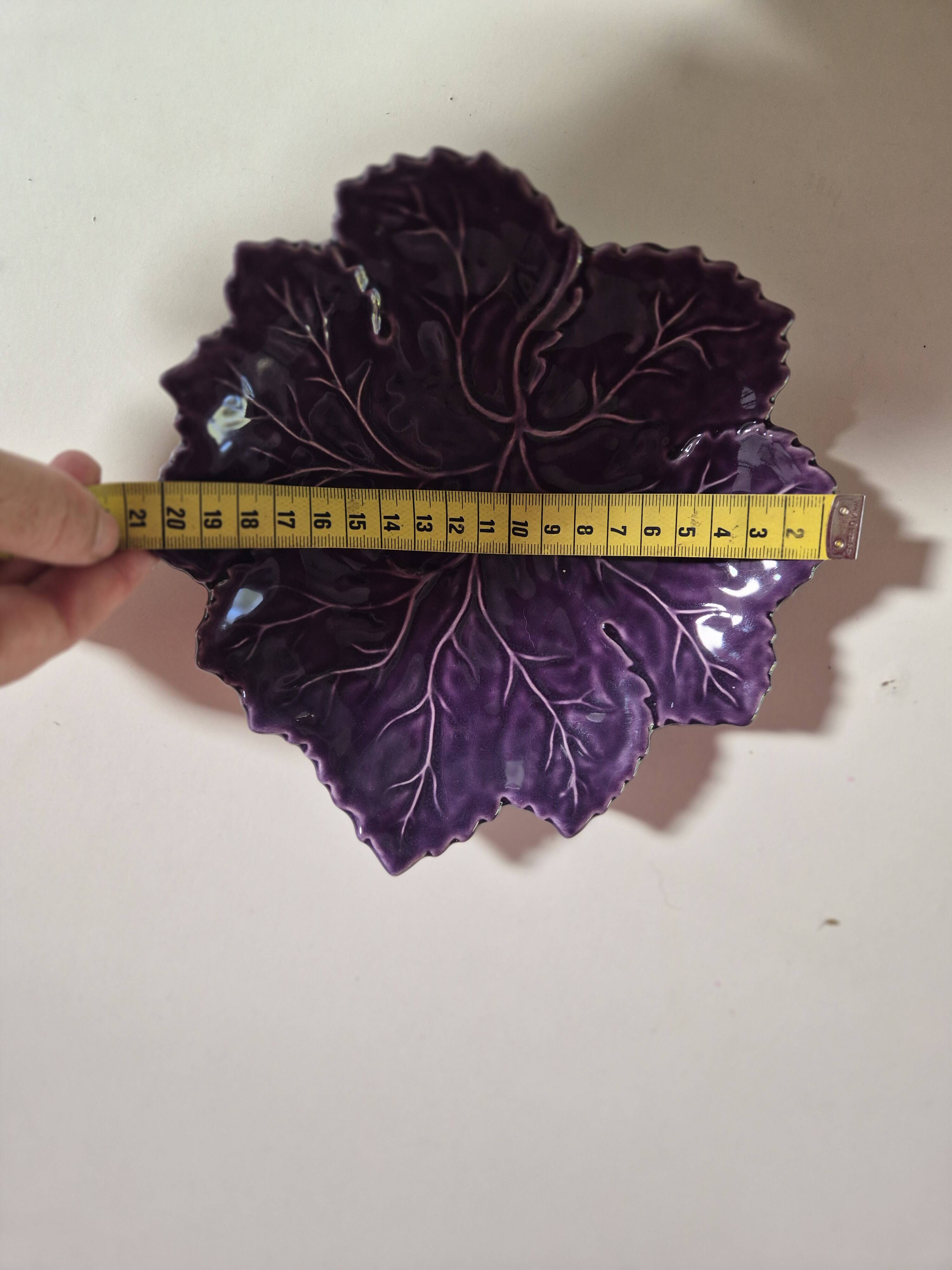 purple ceramic bowl in the shape of a tree leaf