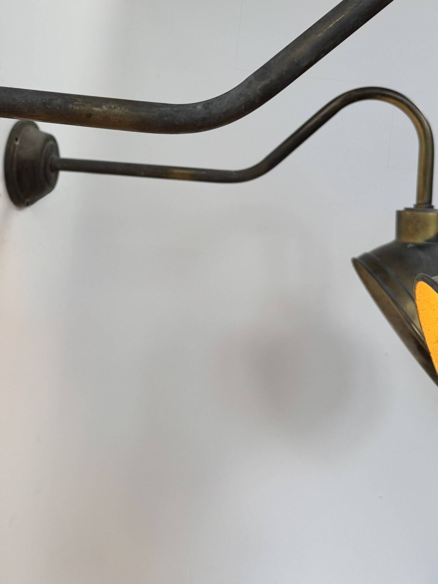 Pair of XL patinated brass wall lights, France, 1970.