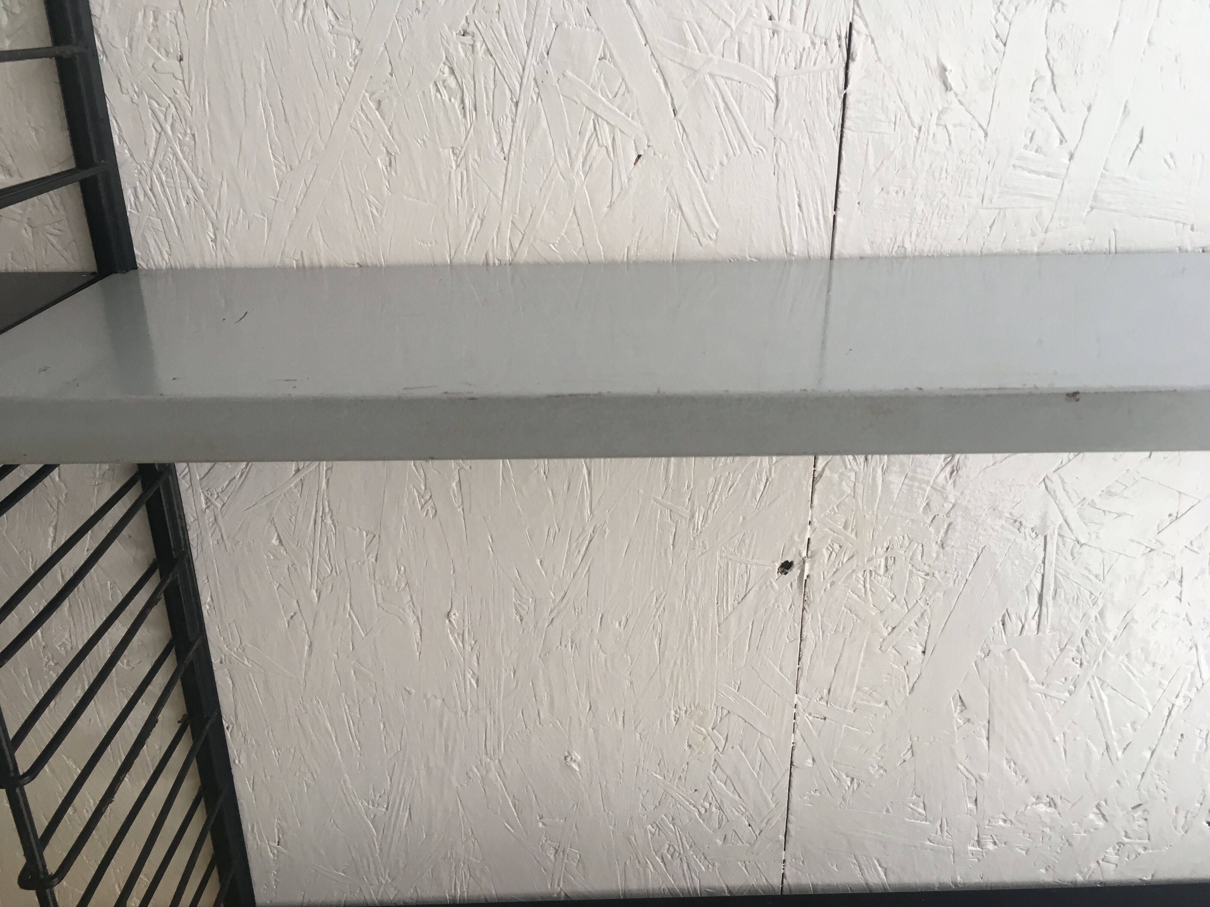 Metal wall book shelving