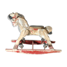 Former rocking horse with wheels