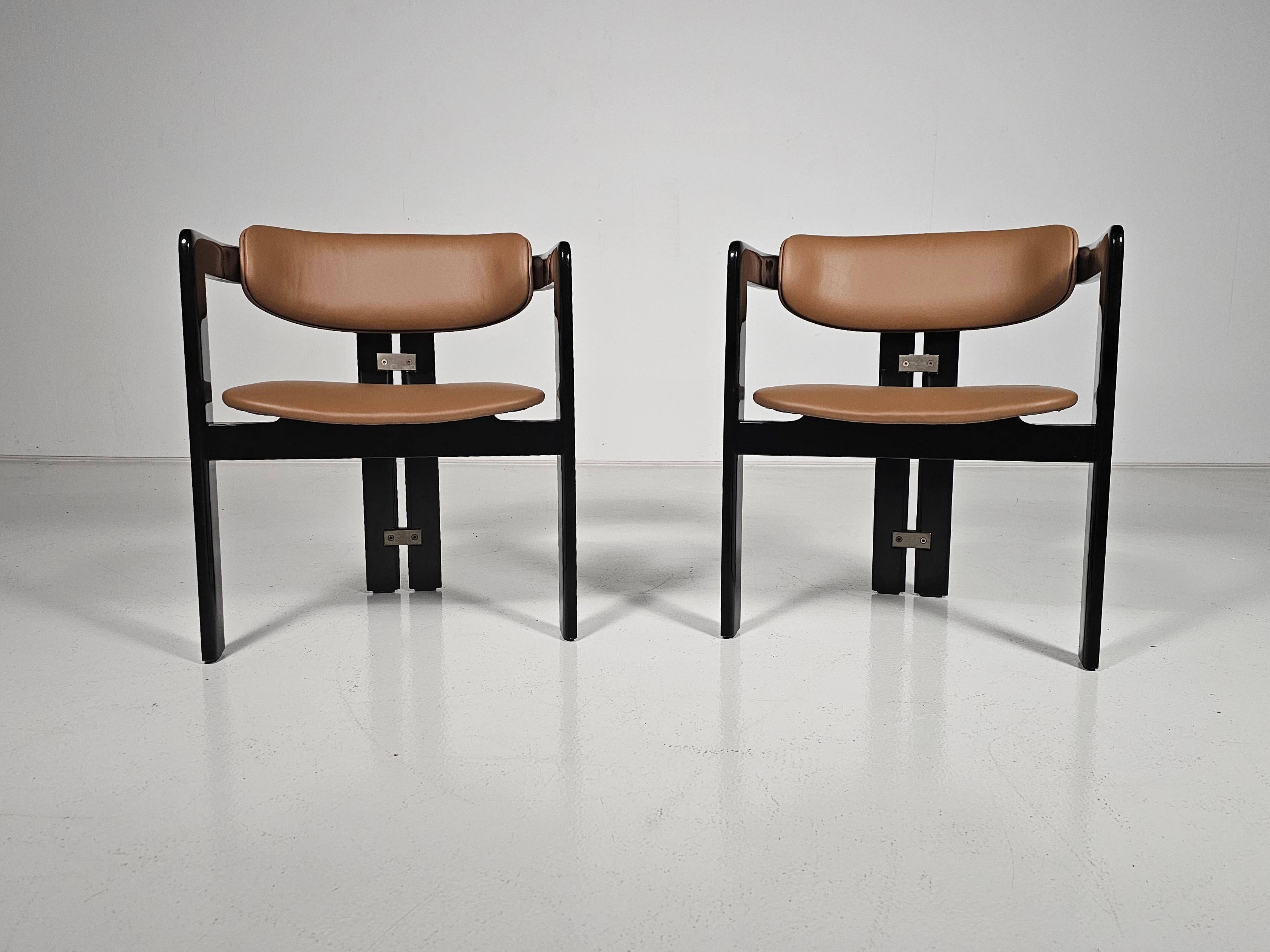 Set of two chairs by Augusto Savini, 1960s.