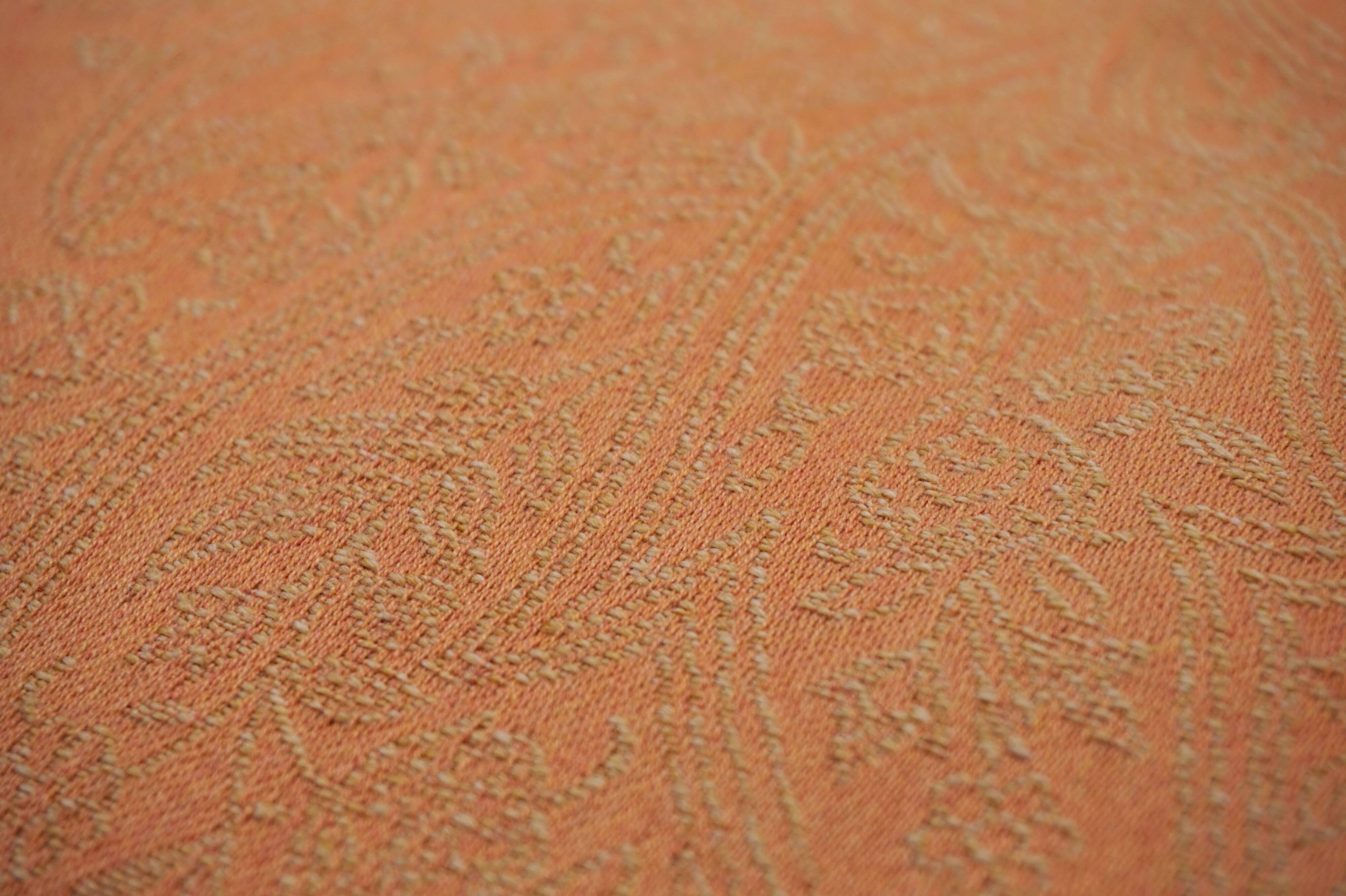 Deep seated armchair in the style of Howard & Sons