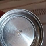 Egg cup and spoon in silver metal