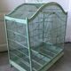 Old wooden and metal birdcage