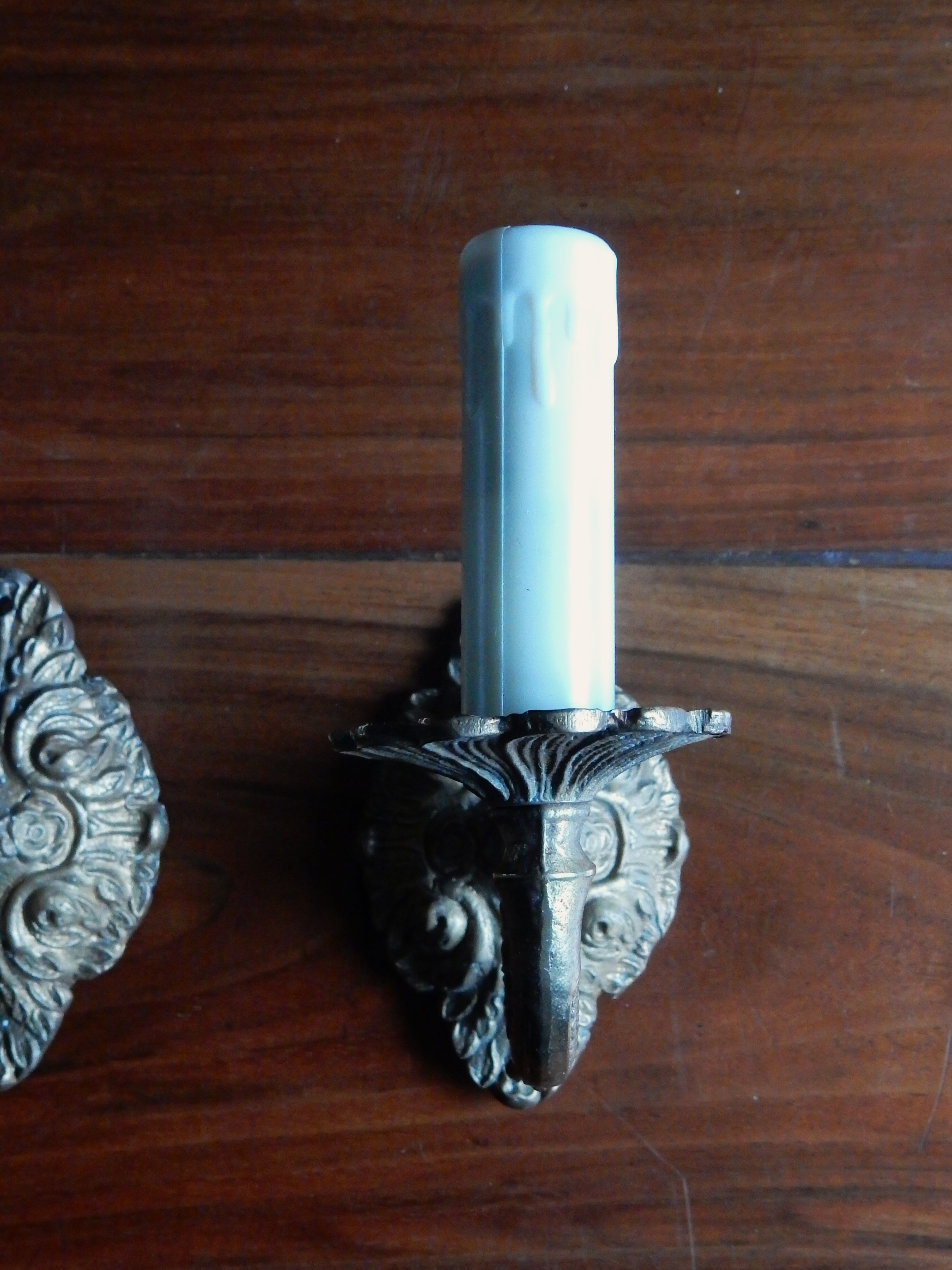 Set of 2 bronze wall chandeliers 1 fire