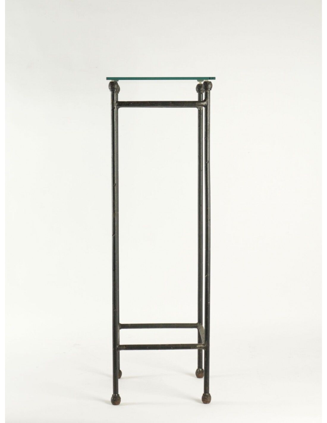 Two consoles, wrought iron sheaths on glass top, twentieth century