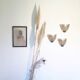 Trio of mother-of-pearl wall lamps
