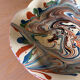 Glazed ceramic plate signed