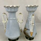 Pair of paris porcelain vases with bird decorations