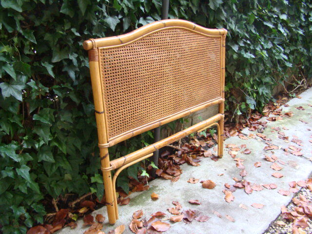 Old rattan wicker headboard
