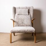 High armchair in curved beech and recent konkav fabric model by paul bode for federholz.