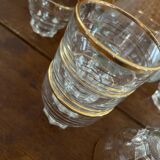 9 vintage gold rimmed glasses.