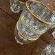 9 verres au liseré doré vintage.