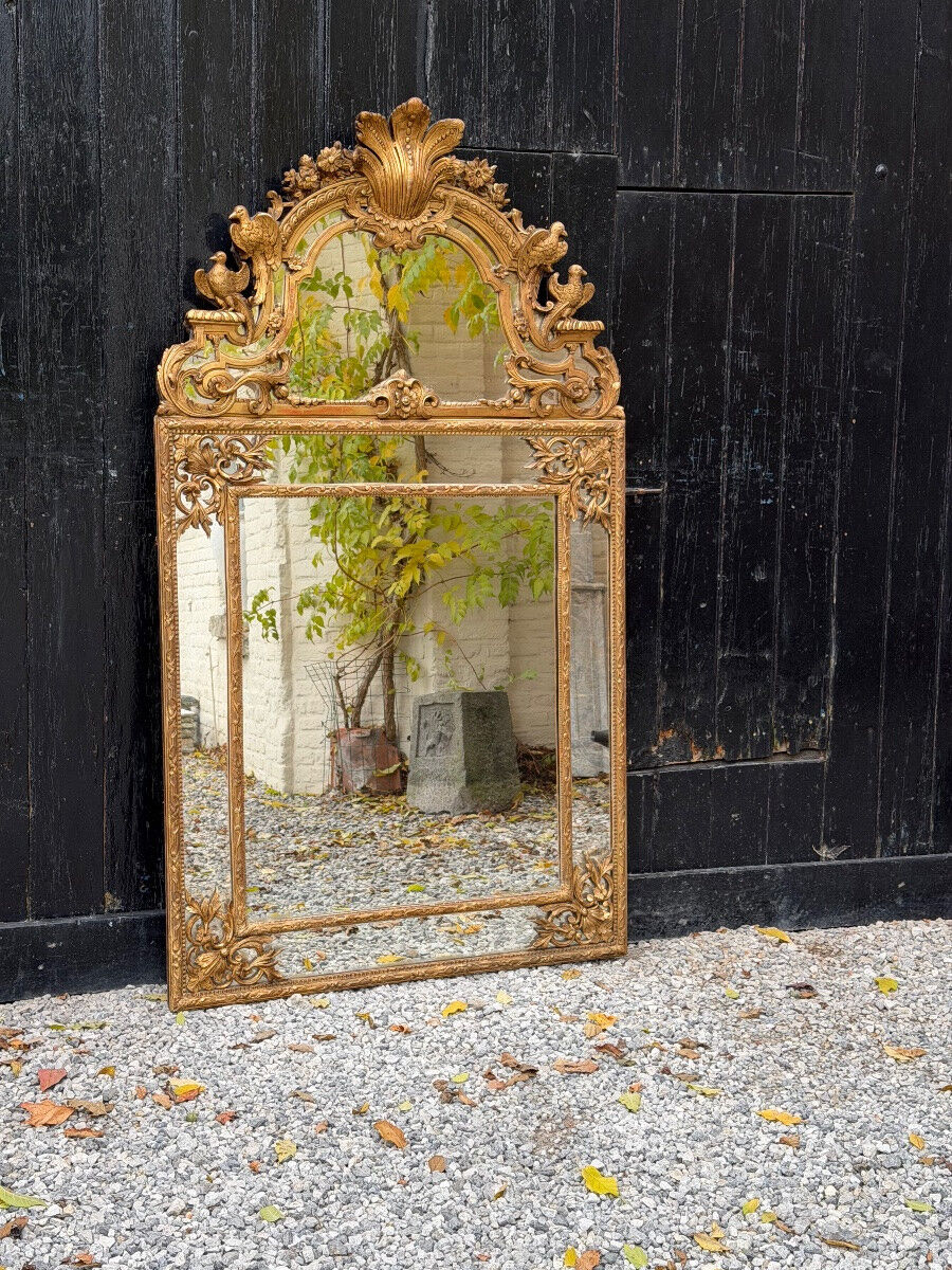 Regency style mirror in gilded wood, 19th century