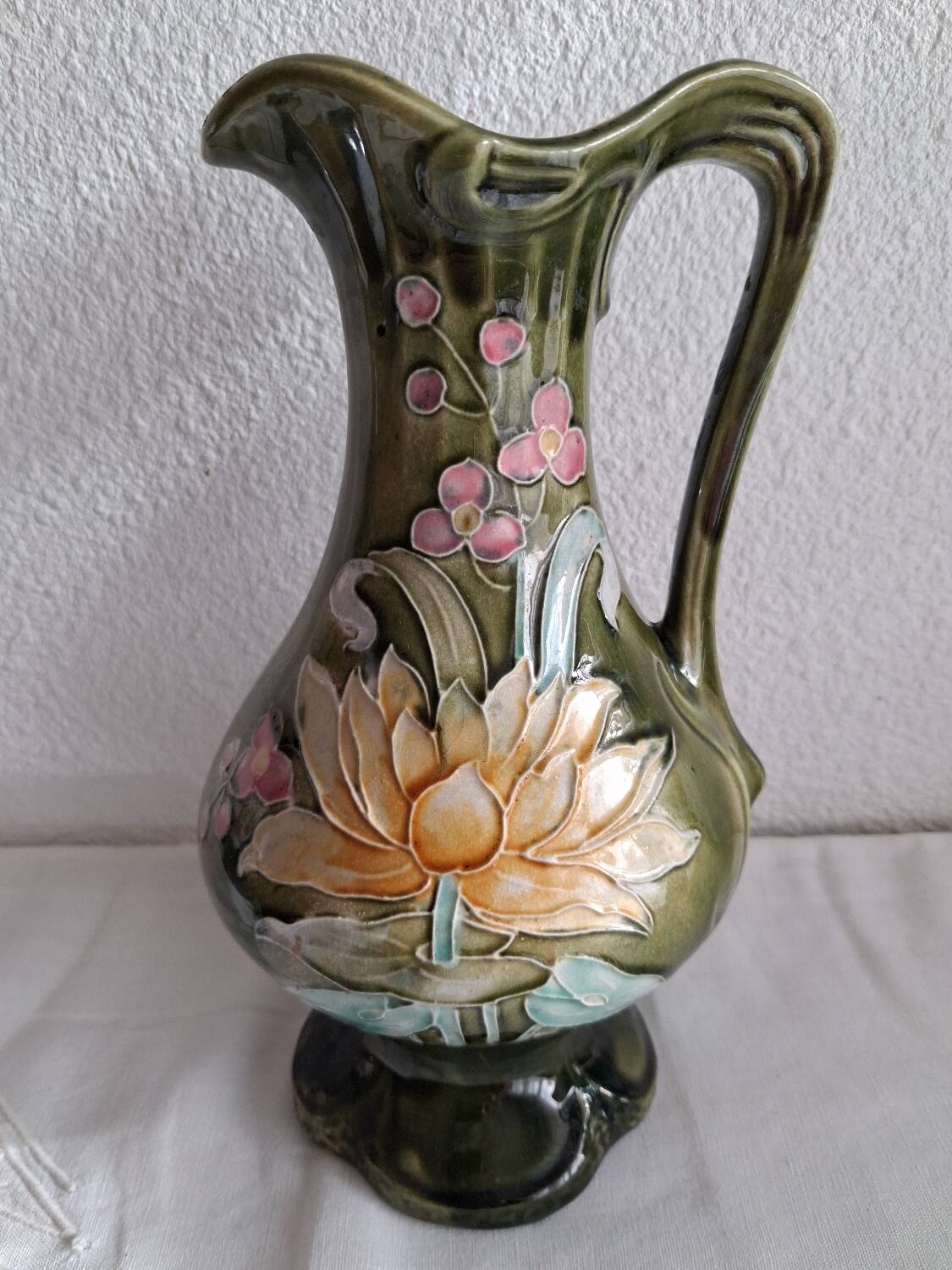 Art Nouveau pitcher in slipware