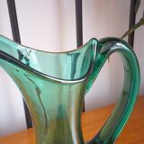 Pitcher made of green glass blown and tinted in the mass