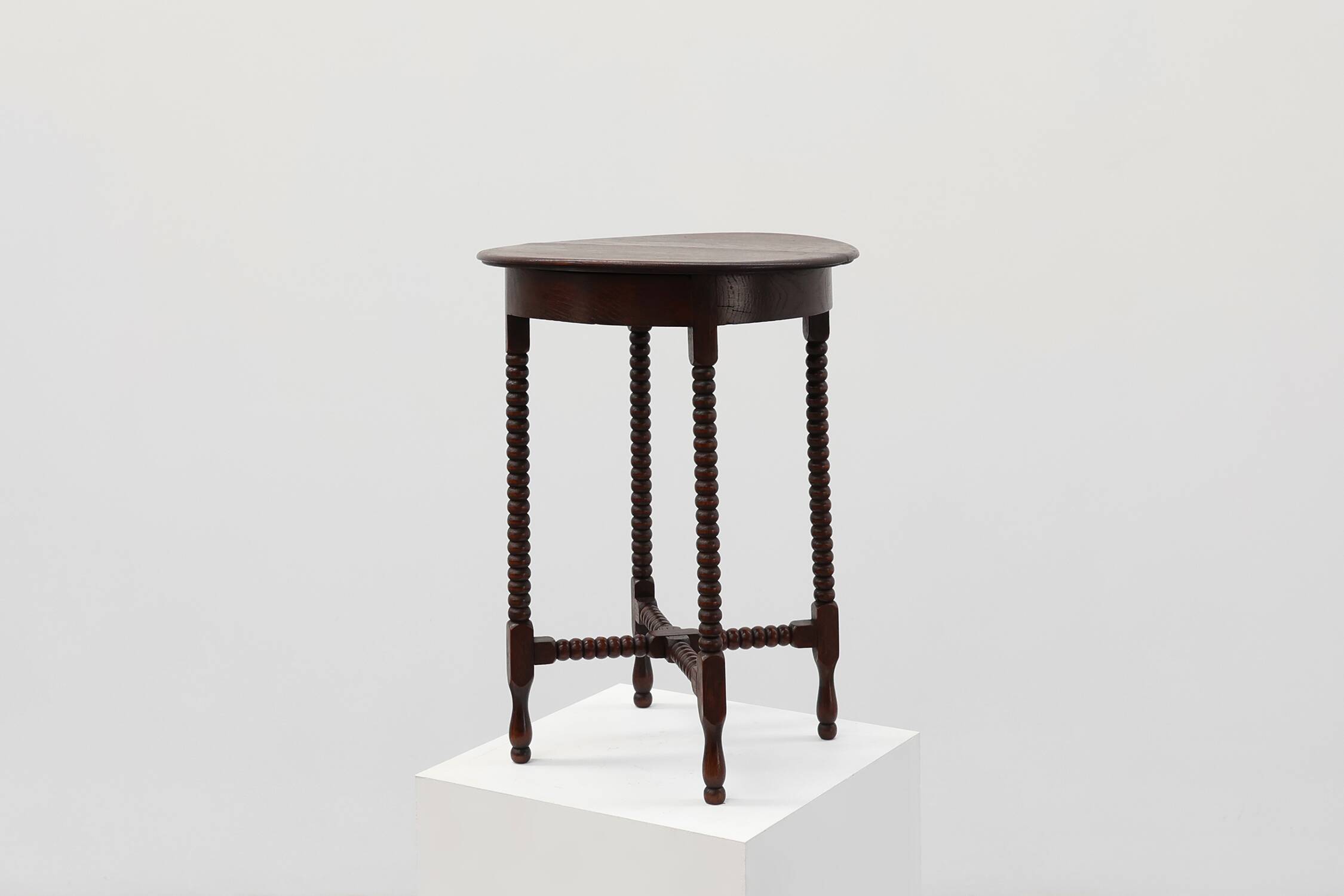 Art Deco round wooden side table with spindle legs, France circa 1900