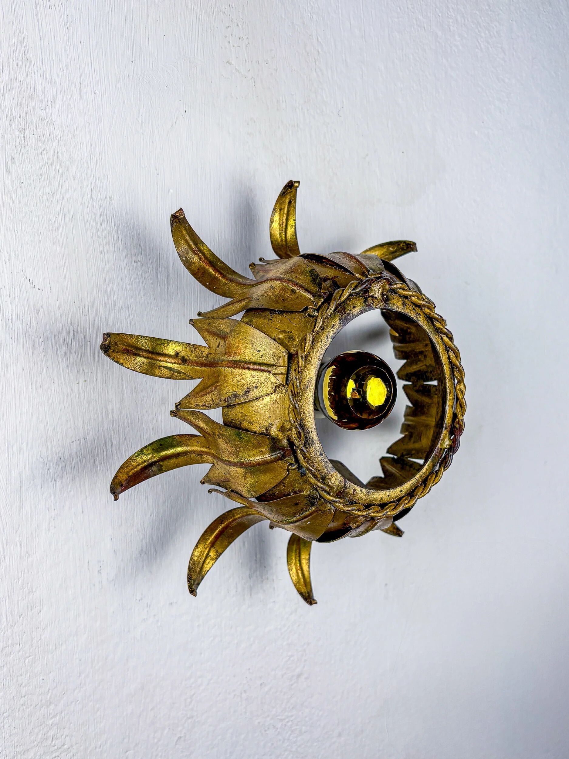 Sunburst ceiling light fixture or sconce in gilt wrought iron, Spain, 1960s