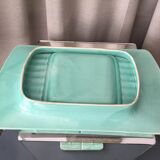 Asparagus dish with drainer in water green tones