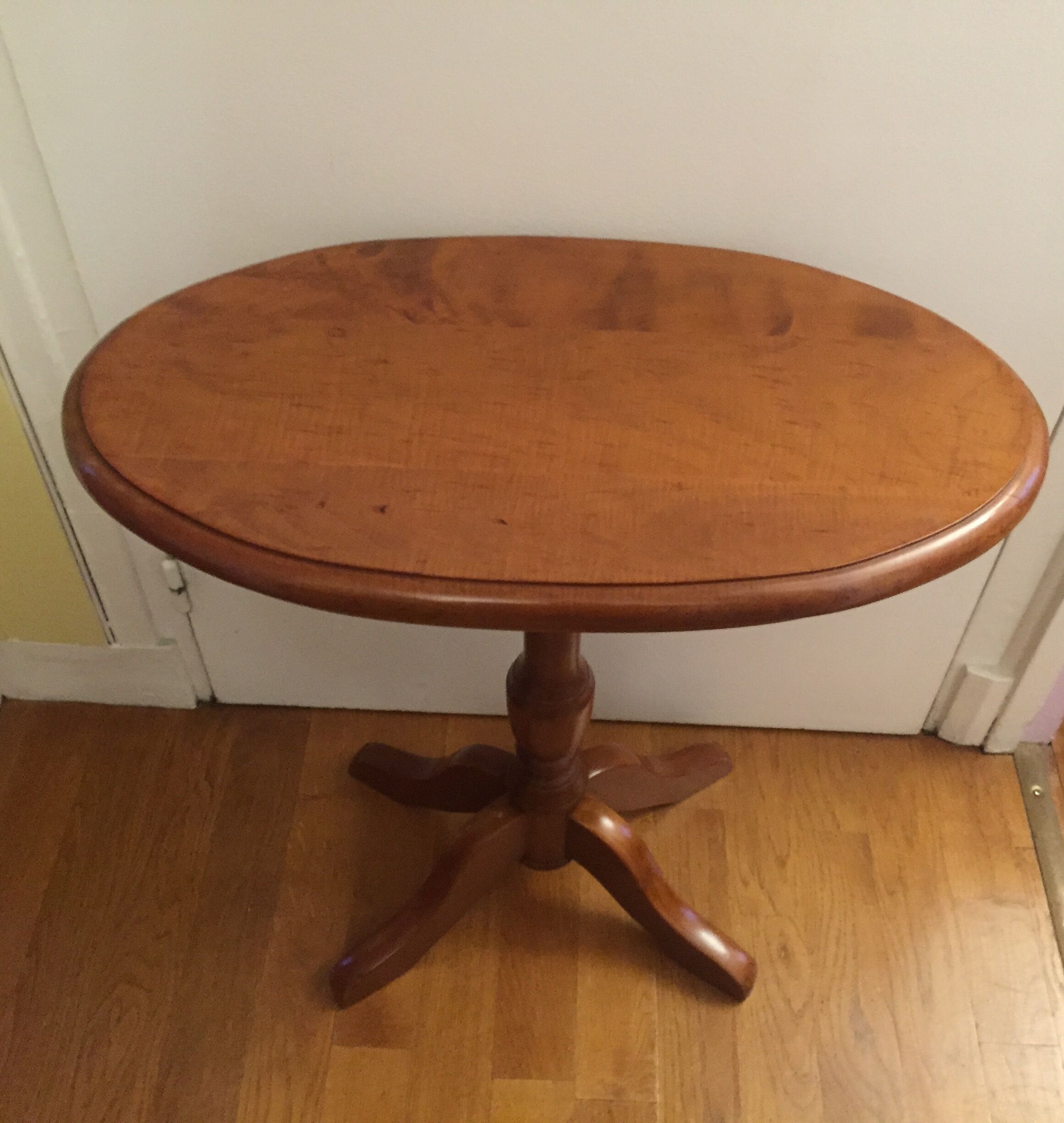 Oval pedestal table