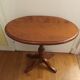 Oval pedestal table