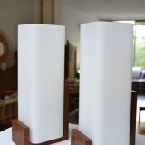 Pair of Louis Kalff opaline and teak wall lamps