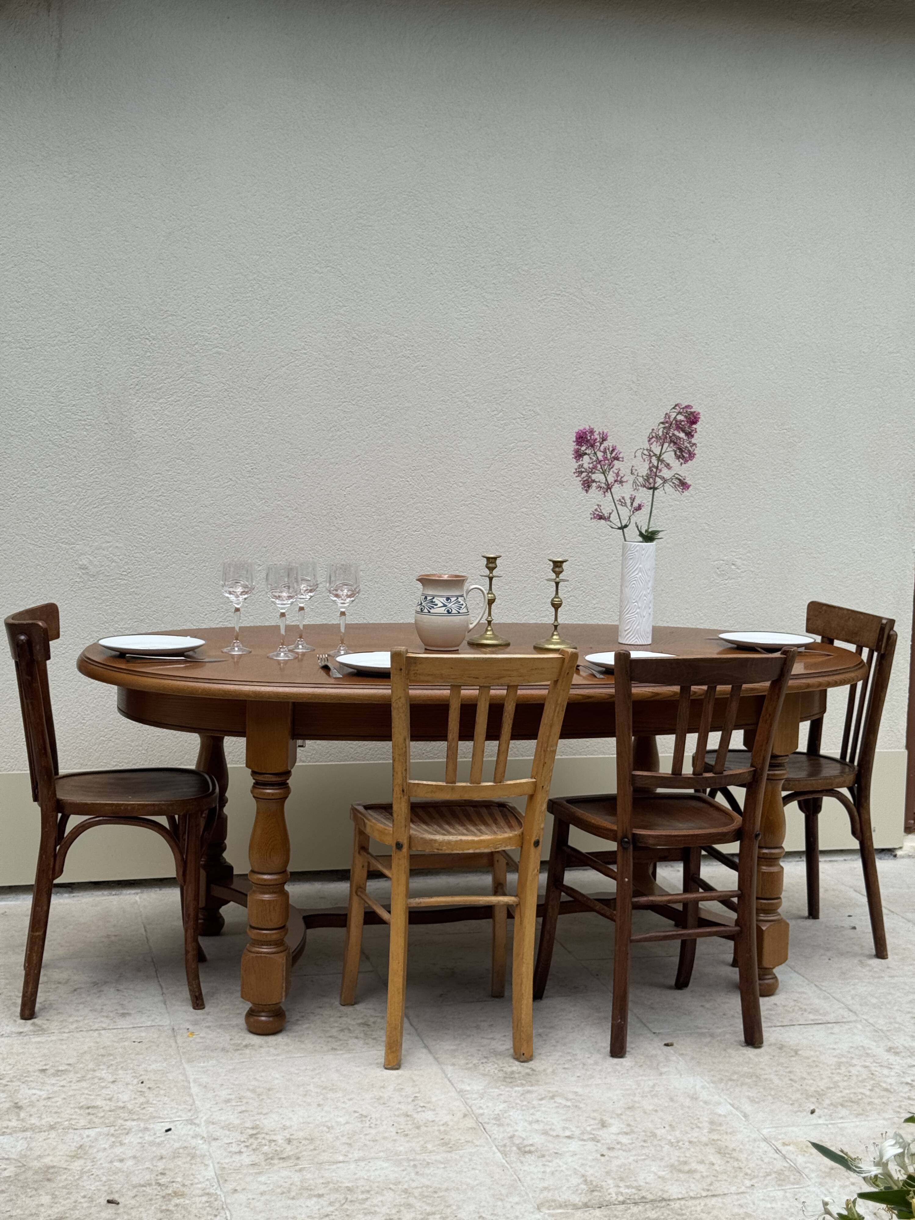 Oak dining table, oval living room table with two extensions.