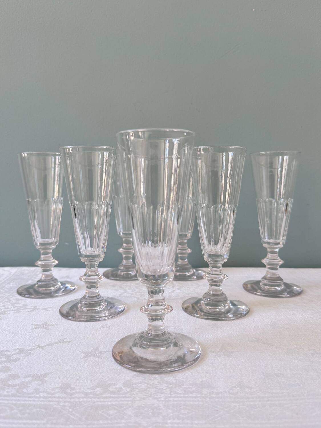 Set of 7 Baccarat crystal champagne flutes