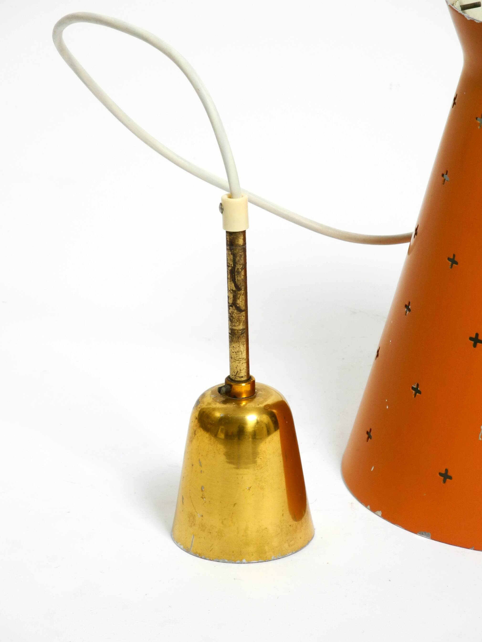 Beautiful Mid Century Modern Diabolo perforated metal sheet pendant lamp