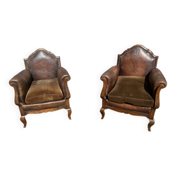 Pair of club armchairs in wood and leather, early 20th century.
